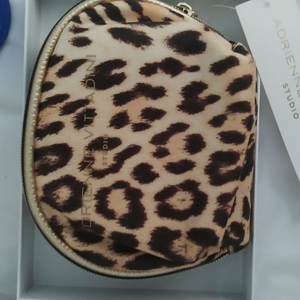 NWT. Adrienne Vittadini Brown and Black Cosmetic Bags with Leopard Print
